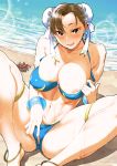  anklet bare_shoulders barefoot beach bikini blue_bikini breasts brown_eyes chun-li collarbone commentary_request crab crotch_grab day double_bun highres jewelry large_breasts looking_at_viewer navel nipple_slip nipples ojo_(dfreak) raised_eyebrow revision sitting skindentation smile solo street_fighter swimsuit thick_thighs thighs 