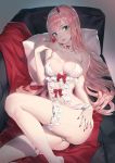  bed_sheet bikini breasts candy cleavage commentary_request couch darling_in_the_franxx eyebrows_visible_through_hair eyeshadow food green_eyes hair_between_eyes hairband highres horns large_breasts lollipop long_hair makeup mhk_(mechamania) nail_polish oni_horns pillow pink_hair red_horns red_nails red_ribbon ribbon straight_hair swimsuit white_bikini white_hairband zero_two_(darling_in_the_franxx) 