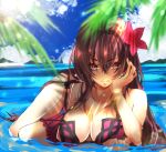  beach bikini blue_sky breasts cloud cloudy_sky day fate/grand_order fate_(series) flower hair_flower hair_intakes hair_ornament hibiscus large_breasts looking_at_viewer mountainous_horizon palm_tree partially_submerged pink_bikini purple_bikini purple_hair red_eyes scathach_(fate)_(all) scathach_(swimsuit_assassin)_(fate) sky smile sun swimsuit tree user_ypxc4745 water 