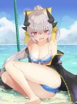  1girl absurdres ass beach bikini blue_bikini bow breasts cleavage commentary_request day detached_collar dragon_girl dragon_horns eyebrows_visible_through_hair eyes_visible_through_hair fate/grand_order fate_(series) frilled_bikini frills hair_bow highres horns kiyohime_(fate/grand_order) kiyohime_(swimsuit_lancer)_(fate) ocean open_mouth outdoors red_eyes ribbon see-through sitting solo swimsuit thighs yellow_bikini yellow_ribbon 