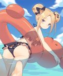  abigail_williams_(fate/grand_order) ass bikini blonde_hair blue_eyes blue_sky bow commentary_request day double_bun emerald_float fate/grand_order fate_(series) hair_bow innertube long_hair looking_at_viewer looking_back ocean sidelocks sky smile solo swimsuit unmoving_pattern water yura_(botyurara) 