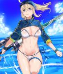  ahoge artoria_pendragon_(all) baseball_cap bikini blonde_hair blue_eyes blue_hat blue_jacket breasts cleavage cloud cropped_jacket day fate/grand_order fate_(series) hair_between_eyes hair_through_headwear hat highres jacket kurosawa_(hjkl42332) large_breasts long_hair long_sleeves looking_at_viewer mysterious_heroine_xx_(foreigner) navel ocean open_mouth outdoors ponytail shrug_(clothing) side-tie_bikini sky solo standing standing_on_one_leg swimsuit thigh_strap thighs twinmyniad wading water weapon white_bikini wristband zipper 
