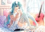  :d acoustic_guitar aqua_eyes aqua_hair bed candy cup food guitar hatsune_miku hima_(ab_gata) holding holding_cup instrument long_hair long_sleeves looking_at_viewer open_mouth picture_(object) picture_frame record sheet_music sitting smile striped striped_legwear thighhighs twintails vocaloid zettai_ryouiki 
