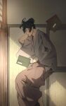  1boy barefoot black_hair book brown_hakama closed_eyes fate/grand_order fate_(series) foot_out_of_frame from_above grey_kimono hakama head_rest highres hijikata_toshizou_(fate) indoors japanese_clothes kimono light_particles long_hair long_sleeves lying male_focus on_floor on_side parted_bangs parted_lips profile short_ponytail shouji sleeping sliding_doors solo sunlight tatami teria_(teriarian) wide_sleeves 