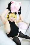  1girl asian blonde_hair breasts brown_eyes cosplay fat headphones large_breasts looking_at_viewer luu_(cosplayer) nitroplus photo sideboob solo super_pochaco super_pochaco_(cosplay) twintails 