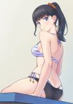  ass bare_shoulders bench bikini black_hair blue_eyes blush breasts butt_crack commentary_request from_side hair_ornament hair_scrunchie halterneck ponytail scrunchie side-tie_bikini sideboob sitting solo ssss.gridman swimsuit takarada_rikka tiger_stripes xi_wan_de_xigua_p 