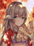  ahoge au_ra autumn ayuanlv bangs blue_eyes blurry blurry_background blush closed_mouth commentary_request dated day depth_of_field dragon_horns eyebrows_visible_through_hair fan final_fantasy final_fantasy_xiv floral_print folding_fan highres holding holding_fan horns japanese_clothes kimono leaf long_hair looking_at_viewer maple_leaf obi outdoors print_kimono red_kimono sash sidelocks signature silver_hair smile solo tree tree_shade upper_body 