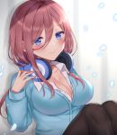  1girl black_legwear blue_cardigan blue_eyes blurry blush breasts brown_hair buttons cleavage collarbone collared_shirt commentary_request depth_of_field go-toubun_no_hanayome hair_between_eyes hand_up headphones headphones_around_neck knees_up large_breasts long_hair long_sleeves looking_at_viewer nakano_miku naomi_(fantasia) pantyhose partially_unbuttoned petals school_uniform shirt sidelocks signature sitting smile solo white_shirt 