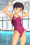  1girl absurdres asics black_eyes black_hair blurry clock collarbone competition_swimsuit cowboy_shot depth_of_field flat_chest highres holding holding_hair indoors looking_at_viewer one-piece_swimsuit one-piece_tan original pool purple_swimsuit rubber_band short_hair solo standing swimsuit takafumi tan tanline 