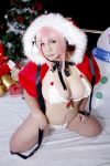  1girl asian breasts chouzuki_maryou christmas christmas_tree cosplay headphones highres large_breasts nitroplus photo pink_hair plump solo super_sonico super_sonico_(cosplay) 