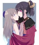  2girls atelier_(series) atelier_totori bangle black_hair blue_eyes bracelet brown_hair cape capelet commentary_request hand_on_another&#039;s_back hand_on_another&#039;s_head hands_on_another&#039;s_chest hug imminent_kiss jewelry long_hair looking_at_viewer maromi_(am97) mimi_houllier_von_schwarzlang multiple_girls ponytail red_eyes simple_background totooria_helmold yuri 
