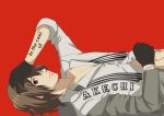  1boy absurdres akechi_gorou black_gloves body_writing brown_hair closed_mouth clothes_writing gloves hand_in_hair highres looking_at_viewer lying male_focus megat0nraid on_back parody partially_unbuttoned persona persona_5 persona_5_the_animation red_background red_eyes simple_background watermark 
