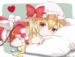  1girl blonde_hair blush clenched_hand eyebrows_visible_through_hair fang fang_out flandre_scarlet grey_background hair_between_eyes hat hat_ribbon head_on_pillow heart highres iyo_(ya_na_kanji) looking_at_viewer lying mob_cap on_stomach pillow pointy_ears red_eyes red_skirt red_vest ribbon shirt short_hair side_ponytail simple_background skirt slit_pupils smile solo touhou vest white_headwear white_shirt wrist_cuffs 