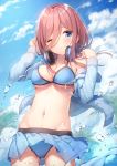  1girl ass_visible_through_thighs bangs bare_shoulders bikini bikini_under_clothes blue_bikini blue_eyes blue_jacket blue_skirt blue_sky breasts brown_hair cleavage closed_mouth cloud cloudy_sky commentary_request cowboy_shot day drawstring go-toubun_no_hanayome hair_between_eyes hands_up headphones headphones_around_neck highres jacket large_breasts long_hair long_sleeves looking_at_viewer miniskirt nakano_miku navel nijihashi_sora off_shoulder one_eye_closed open_clothes open_jacket outdoors palm_tree pleated_skirt sidelocks skirt sky smile solo standing stomach swimsuit tree water 