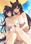  2girls alternate_costume animal_ears atago_(azur_lane) atago_(midsummer_march)_(azur_lane) azur_lane bangs bare_shoulders beach bikini black_hair blush bow breasts brown_eyes casual_one-piece_swimsuit cleavage closed_mouth collarbone commentary_request criss-cross_halter day extra_ears eyebrows_visible_through_hair flower hair_bow hair_flower hair_ornament halterneck highres large_breasts long_hair looking_at_viewer mole mole_under_eye multiple_girls navel one-piece_swimsuit open_mouth outdoors ponytail sarong sitting solo summer swept_bangs swimsuit takao_(azur_lane) takao_(beach_rhapsody)_(azur_lane) white_bikini white_bow white_swimsuit yuko_(uc_yuk) 