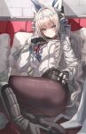 1girl absurdres black_shorts blue_eyes boots commentary couch crown crown_(nikke) denim denim_shorts fishnet_pantyhose fishnets goddess_of_victory:_nikke hair_ornament high_heel_boots high_heels highres jindogod pantyhose shiny_eyes shorts sitting solo twisted_hair 