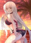  1girl :o ahoge ass back bare_arms bare_shoulders belt bikini black_bikini black_choker breasts brown_eyes choker cloud cloudy_sky commentary_request cowboy_shot fate/grand_order fate_(series) from_behind highres holding holding_hair horizon iroha_(shiki) jeanne_d&#039;arc_(alter_swimsuit_berserker) jeanne_d&#039;arc_(fate)_(all) large_breasts long_hair looking_at_viewer looking_back ocean open_mouth orange_sky outdoors palm_tree sky solo standing sunset swimsuit thighs tree very_long_hair wet white_hair 