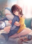  1girl 3: alternate_costume anchor_print backlighting bare_legs bare_shoulders barefoot blinds brown_hair closed_mouth coffee_mug collarbone commentary_request couch cup doll_hug ikea_shark indian_style indoors kantai_collection long_hair looking_at_viewer morigami_(morigami_no_yashiro) mug no_pants off-shoulder_shirt off_shoulder on_couch one_side_up pen pillow plant sendai_(kantai_collection) shirt sidelocks sitting solo stuffed_animal stuffed_shark stuffed_toy table thighs yellow_shirt 