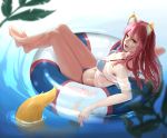  1girl animal_ears bare_legs bare_shoulders bikini blue_bikini breasts cleavage commentary_request fate/grand_order fate_(series) fox_ears fox_tail from_side highres innertube large_breasts long_hair looking_at_viewer lying navel open_mouth pink_hair solo sun_miru swimsuit tail tamamo_(fate)_(all) tamamo_no_mae_(swimsuit_lancer)_(fate) upper_teeth water yellow_eyes 