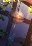  blurry blurry_foreground cloud cloudy_sky commentary_request depth_of_field dutch_angle evening highres mocha_(cotton) no_humans original reflection scenery signature sky sunset twilight wind_chime wind_chime_focus 