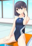  1girl black_hair blue_eyes blue_swimsuit breasts competition_swimsuit cowboy_shot hand_on_own_thigh highres indoors light_smile logo looking_away low_twintails one-piece_swimsuit original short_hair sitting small_breasts solo starting_block swimsuit takafumi twintails window 