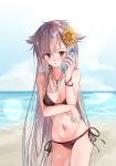  1girl alternate_costume azur_lane bangs bare_legs beach bikini black_bikini blush bottle bracelet breasts breasts_apart collarbone commentary_request day flower grey_hair hair_flower hair_ornament highres holding holding_bottle jewelry long_hair looking_at_viewer medium_breasts montpelier_(azur_lane) navel necklace ocean outdoors ramune red_eyes ring sand shell_necklace shokoori side-tie_bikini solo standing sunflower sunlight swimsuit very_long_hair water wedding_band wet 