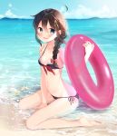  1girl adapted_costume ahoge barefoot beach bikini black_bikini black_hair blue_eyes blue_sky braid breasts cloud day hair_between_eyes hair_ornament hair_over_shoulder highres innertube island kantai_collection long_hair looking_at_viewer naoto_(tulip) outdoors pink_innertube remodel_(kantai_collection) shigure_(kantai_collection) side-tie_bikini single_braid sitting sky small_breasts solo swimsuit wariza water 