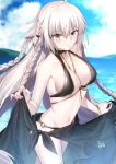  1girl ahoge bangs bare_shoulders beach bikini black_bikini blue_sky blush bracelet braid breasts cleavage closed_mouth collarbone eyebrows_visible_through_hair fate/grand_order fate_(series) gogatsu_fukuin hair_between_eyes heroic_spirit_chaldea_park_outfit highres jeanne_d&#039;arc_(alter)_(fate) jeanne_d&#039;arc_(fate)_(all) jewelry large_breasts long_hair looking_at_viewer navel necklace pale_skin sarong silver_hair sky solo swimsuit thighs very_long_hair yellow_eyes 