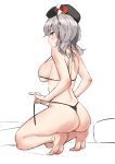  1girl alternate_costume ass bangs bare_legs bare_shoulders bed bikini black_bikini blue_eyes breasts closed_mouth eyebrows_visible_through_hair from_behind hat highres holding kantai_collection kashima_(kantai_collection) kneeling large_breasts looking_at_viewer looking_back micro_bikini silver_hair sketch skindentation smile solo soushou_nin swimsuit thighs twintails 