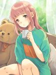  1girl aqua_shirt bangs blunt_bangs brown_hair cup curtains indoors kamogawa_akira looking_at_viewer medium_hair mug on_bed original pillow shirt sidelocks sitting solo stuffed_animal stuffed_toy t-shirt teddy_bear window yellow_eyes 