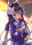  1girl animal_ear_fluff animal_ears bangs black_hair blue_kimono blurry blurry_background blush bow candy_apple cat_ears cat_girl cat_mask cat_tail commentary_request covered_mouth depth_of_field eyebrows_visible_through_hair floral_print food green_eyes hair_between_eyes hair_bow highres holding holding_food japanese_clothes kimono kyaru_(princess_connect) long_hair long_sleeves low_twintails mask mask_on_head mizutan64 multicolored_hair obi princess_connect! princess_connect!_re:dive print_kimono red_bow ringlets sash solo streaked_hair tail twintails twitter_username two-handed very_long_hair white_hair wide_sleeves 