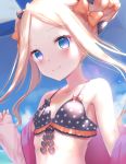  1girl abigail_williams_(fate/grand_order) bangs bare_shoulders bikini black_bikini black_bow blonde_hair blue_eyes blue_sky blurry blurry_background blush bow breasts closed_mouth collarbone day depth_of_field double_bun eyebrows_visible_through_hair fate/grand_order fate_(series) fingernails forehead hair_bow hands_up highres jacket kachayori long_hair long_sleeves off_shoulder open_clothes open_jacket orange_bow outdoors parted_bangs pinching_sleeves pink_jacket polka_dot polka_dot_bikini polka_dot_bow sky sleeves_past_wrists small_breasts smile solo swimsuit upper_body very_long_hair 