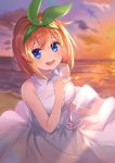  1girl :d bangs bare_arms bare_shoulders beach blue_eyes blurry blurry_background breasts brown_hair cloud collared_dress commentary_request depth_of_field dress eyebrows_behind_hair go-toubun_no_hanayome green_ribbon hair_between_eyes hair_ribbon hand_up highres horizon long_hair medium_breasts nakano_yotsuba ocean omelet_tomato open_mouth outdoors ribbon round_teeth sky sleeveless sleeveless_dress smile solo sunset teeth upper_teeth white_dress 