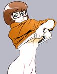  bottomless breasts colorized freckles groin medium_breasts navel orange_shirt qiqo scooby-doo shirt shirt_lift sleeves_pushed_up solo underboob undressing velma_dace_dinkley 