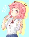  1girl bangs blue_background blue_skirt collared_shirt commentary_request doki_doki_literature_club eyebrows_visible_through_hair foreshortening hair_ornament hair_ribbon hairclip holding looking_at_viewer nan natsuki_(doki_doki_literature_club) neck_ribbon pink_eyes pink_hair pleated_skirt red_neckwear red_ribbon ribbon school_uniform shirt short_sleeves skirt solo swept_bangs two-tone_background two_side_up upper_body white_shirt yellow_background 