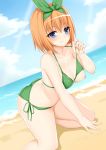  1girl ass bangs bare_shoulders beach bikini blue_eyes blush breasts cleavage collarbone commentary day eyebrows_visible_through_hair go-toubun_no_hanayome green_bikini green_ribbon hair_between_eyes hair_ribbon kneeling large_breasts looking_at_viewer nakano_yotsuba nipples orange_hair outdoors ribbon short_hair smile solo swimsuit toshishikisai 