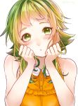  1girl bare_shoulders blush clenched_hands collar commentary frilled_shirt frills green_eyes green_hair gumi hands_on_own_cheeks hands_on_own_face head_rest highres looking_at_viewer mai_mugi orange_shirt parted_lips shirt short_hair_with_long_locks shoulder_blush sidelocks simple_background sleeveless sleeveless_shirt solo talking twitter_username upper_body vocaloid white_background white_collar 