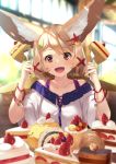  1girl :d animal_ear_fluff animal_ears bangs bare_shoulders blonde_hair blurry blurry_background blurry_foreground breasts brown_eyes cake chair collarbone commentary_request depth_of_field dress eyebrows_visible_through_hair food fork fox_ears fox_girl hair_ornament hairclip hands_up highres holding holding_fork off-shoulder_dress off_shoulder on_chair open_mouth original short_sleeves sitting slice_of_cake small_breasts smile solo swiss_roll table white_dress wide_sleeves yuuji_(yukimimi) 