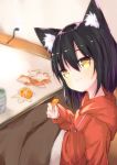  1girl animal_ear_fluff animal_ears bangs black_hair cat_ears cat_girl choro_tofu closed_mouth commentary_request cup drawstring electric_socket food fruit hair_between_eyes highres hood hood_down hoodie kotatsu long_sleeves looking_at_viewer mandarin_orange original short_hair sitting sketch slit_pupils smile table teacup yellow_eyes 