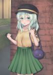  1girl adapted_costume bag bangs black_headwear blush brick_wall casual cellphone collarbone commentary_request contemporary cowboy_shot green_eyes green_hair green_skirt hair_between_eyes hand_up handbag highres holding holding_phone komeiji_koishi long_hair looking_at_viewer miniskirt outdoors parted_lips partial_commentary phone pleated_skirt puffy_short_sleeves puffy_sleeves shirt short_sleeves skirt smartphone solo standing touhou yellow_shirt ys_kosato 