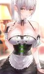  1girl apron bangs bare_shoulders blurry blurry_background blush breasts bridal_gauntlets cleavage closed_mouth corset detached_collar detached_sleeves green_eyes grey_hair hair_ornament hairclip hand_up highres indoors kfr lamp large_breasts looking_at_viewer maid maid_headdress original ponytail sidelocks sitting wrist_cuffs 