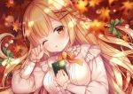  1girl ;o autumn_leaves blonde_hair blurry blurry_foreground blush book bow braid breasts commentary_request depth_of_field fingernails green_bow hair_bow hair_ornament hairclip hand_up leaf long_hair long_sleeves looking_at_viewer lying maple_leaf medium_breasts mitsuba_choco on_back one_eye_closed orange_bow original parted_lips puffy_long_sleeves puffy_sleeves red_eyes shirt sleeves_past_wrists solo upper_body white_shirt x_hair_ornament 