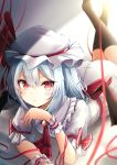  1girl ascot ass bangs bat_wings black_legwear blurry bow brooch closed_mouth collared_dress dress frills hair_between_eyes hat jewelry kneehighs looking_at_viewer lying mob_cap on_stomach red_bow red_eyes red_neckwear red_ribbon remilia_scarlet renka_(cloudsaikou) ribbon short_hair short_sleeves silver_hair slit_pupils solo touhou white_dress white_headwear wings wrist_cuffs 
