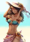  1girl armlet armpits bandeau bangs bare_shoulders beach bikini blue_bikini blurry blurry_background breasts brown_hair cleavage closed_mouth collarbone commentary_request cowgirl_position curly_hair dark_skin day depth_of_field eyebrows_visible_through_hair facial_mark flower hands_on_headwear hat hat_flower jewelry long_hair looking_at_viewer medium_breasts necklace ocean original outdoors red_eyes sarong solo straddling strapless strapless_bikini sun_hat sunflower sweat swimsuit underboob wani_(fadgrith) water white_headwear 
