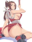  1girl ass bare_shoulders black_footwear black_mutou breasts brown_eyes brown_hair closed_fan commentary_request fan fatal_fury folding_fan grin high_ponytail highres large_breasts looking_back ninja pelvic_curtain ponytail revealing_clothes rope shiranui_mai sideboob sitting smile the_king_of_fighters thighs wariza 