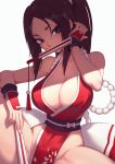  1girl breasts brown_eyes brown_hair cleavage closed_fan collarbone fan fatal_fury folding_fan highres large_breasts liyart long_hair looking_at_viewer mouth_hold obi sash shiranui_mai simple_background sitting solo the_king_of_fighters white_background 