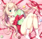  1girl ahoge animal_ears armpit_peek bare_shoulders blonde_hair commentary_request double_bun green_eyes hair_ornament holding holding_pillow knees_together_feet_apart long_hair looking_at_viewer lying neck_ribbon on_back original pan_(mimi) pillow ribbon snowflake_hair_ornament socks solo white_legwear 