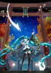  1girl aqua_eyes aqua_hair autumn_leaves boots hair_ornament hatsune_miku highres kyoto leaf long_hair maple_leaf microphone skirt thigh_boots thighhighs torii twintails very_long_hair vocaloid 