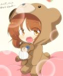  1girl :d animal_costume bandages bangs bear_costume bear_hood blurry bokeh boko_(girls_und_panzer) boko_(girls_und_panzer)_(cosplay) brown_eyes brown_hair commentary cosplay dated depth_of_field eyebrows_visible_through_hair girls_und_panzer holding holding_stuffed_animal hood hood_up jinguu_(4839ms) looking_at_viewer nishizumi_miho open_mouth short_hair sitting smile solo stuffed_animal stuffed_toy teddy_bear twitter_username younger 