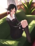 1girl backlighting bangs black_dress black_hair black_legwear breasts cait closed_mouth collarbone collared_dress commentary_request couch curtains dress eyebrows_visible_through_hair folded_ponytail full_body hair_ribbon highres indoors kaguya-sama_wa_kokurasetai_~tensai-tachi_no_renai_zunousen~ kneehighs knees_up leg_hug neck_ribbon no_shoes on_couch parted_bangs plant red_eyes red_ribbon ribbon shinomiya_kaguya small_breasts smile solo window 